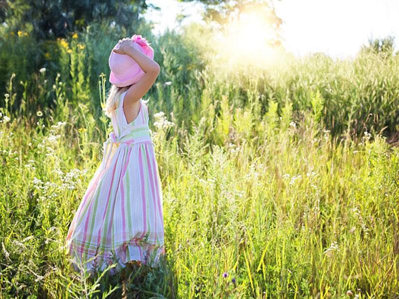 Floral print ruffled sundress with adjustable straps and side pockets