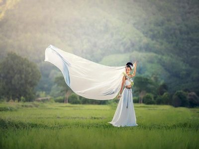 Enchanting Girls Trolling the Night in Nadine Merabi’s Talia Midi Wrap Dinner Dress