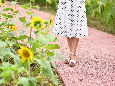 Dressed to Impress White Cardigan and Floral Sash Dress with Canine Companion